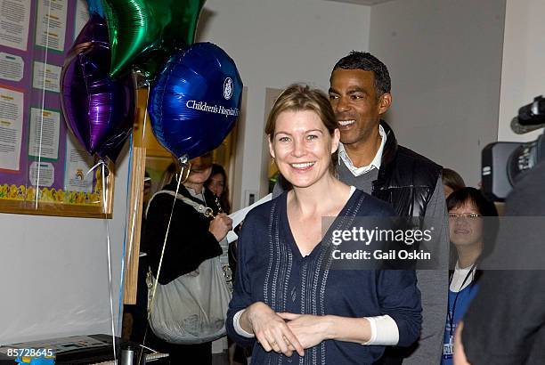 Ellen Pompeo and her husband Chris Ivery visit the Children's Hospital Boston on March 30, 2009 in Boston, Massachusetts.