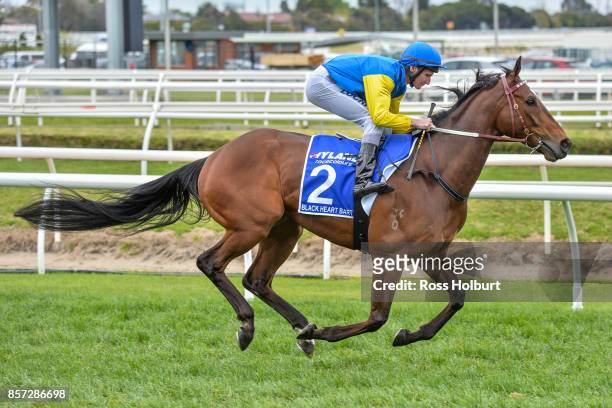 /h2/ ridden by /j2/ before the /r7/ at Caulfield Racecourse on October 01, 2017 in Caulfield, Australia.