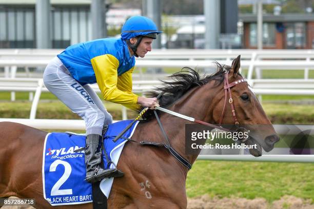 /h2/ ridden by /j2/ before the /r7/ at Caulfield Racecourse on October 01, 2017 in Caulfield, Australia.