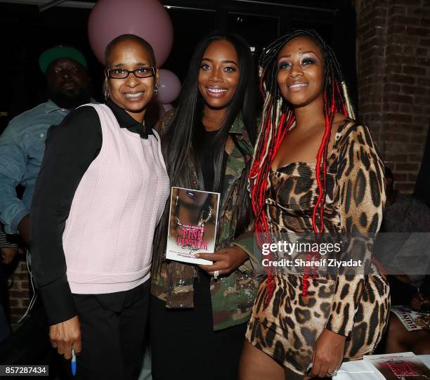 Yandy Smith, Wahida Clark and Sunshine Smith-Williams attends The Pink Panther Clique book release party hosted by Yandy Smith at Manhattan Brew &...