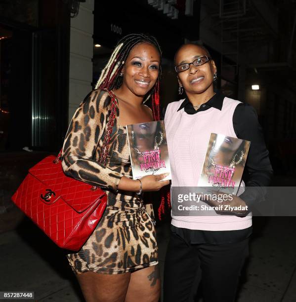 Wahida Clark and Sunshinse Smith-Williams attends The Pink Panther Clique book release party hosted by Yandy Smith at Manhattan Brew & Vine on...