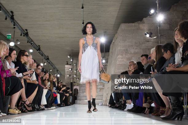 Heather Kemesky walks the runway during the Louis Vuitton Paris show as part of the Paris Fashion Week Womenswear Spring/Summer 2018 on October 3,...