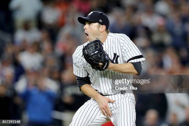 David Robertson of the New York Yankees reacts after hitting catcher Gary Sanchez with a wild pitch against the Minnesota Twins during the sixth...