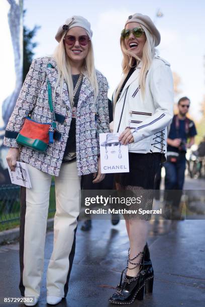 Cailli & Sam Beckerman are seen attending Chanel during Paris Fashion Week wearing Chanel on October 3, 2017 in Paris, France.