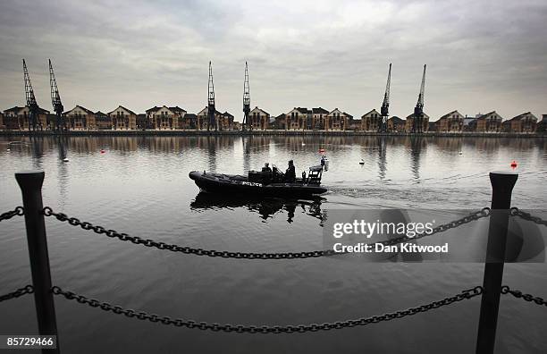 Police boat patrols as security measures are tightened around the Excel Centre in preparation for the G20 leaders' summit, March 31, 2009 in London,...