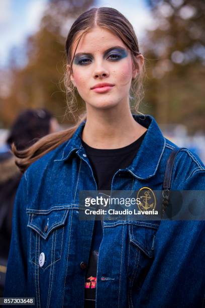 Model is seen after the Chanel show during Paris Fashion Week Womenswear SS18 on October 3, 2017 in Paris, France.