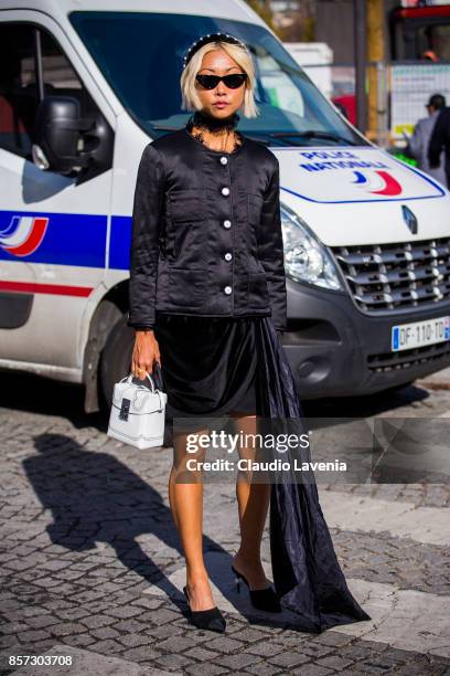 Guest is seen in the streets of Paris, after the Chanel show during Paris Fashion Week Womenswear SS18 on October 3, 2017 in Paris, France.