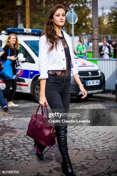 Model Greta Varlese is seen on the streets of Paris, after the Chanel show during Paris Fashion Week Womenswear SS18 on October 3, 2017 in Paris,...