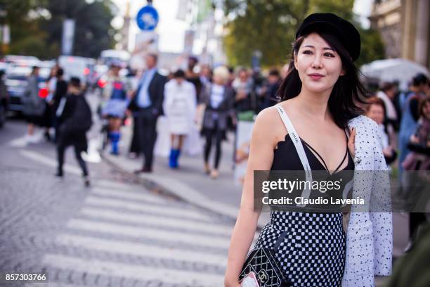 Guest is seen after the Chanel show during Paris Fashion Week Womenswear SS18 on October 3, 2017 in Paris, France.