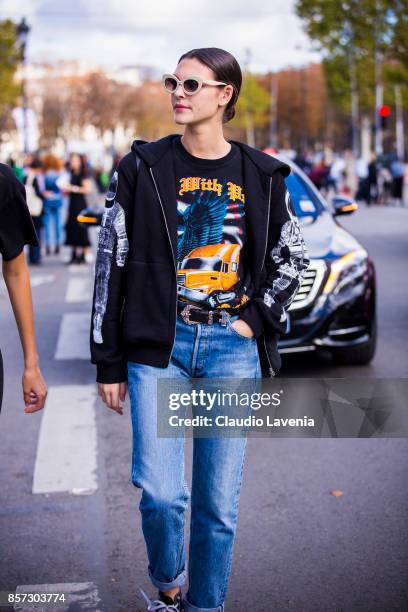 Model Vittoria Ceretti is seen on the streets of Paris, after the Chanel show during Paris Fashion Week Womenswear SS18 on October 3, 2017 in Paris,...