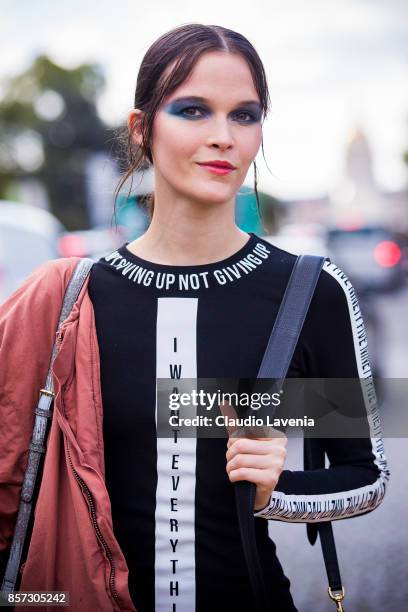 Model is seen after the Chanel show during Paris Fashion Week Womenswear SS18 on October 3, 2017 in Paris, France.