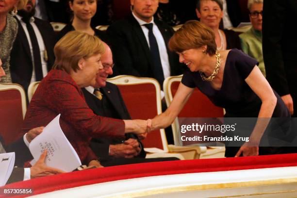 German Chancellor Angela Merkel, her husband Joachim Sauer , politician Norbert Lammertand Elke Buedenbender attend the Re-Opening of the Staatsoper...