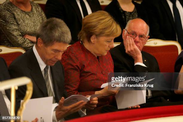German Chancellor Angela Merkel, her husband Joachim Sauer and politician Norbert Lammert attend the Re-Opening of the Staatsoper Unter den Linden on...