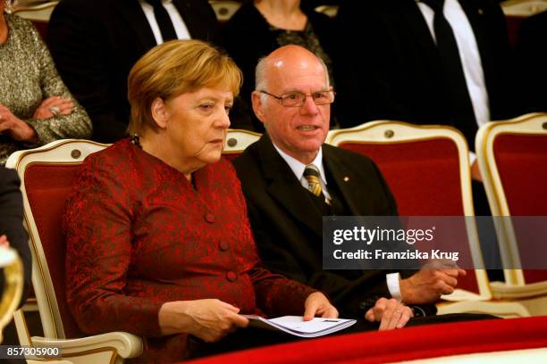 German Chancellor Angela Merkel and politician Norbert Lammert attend the Re-Opening of the Staatsoper Unter den Linden on October 3, 2017 in Berlin,...