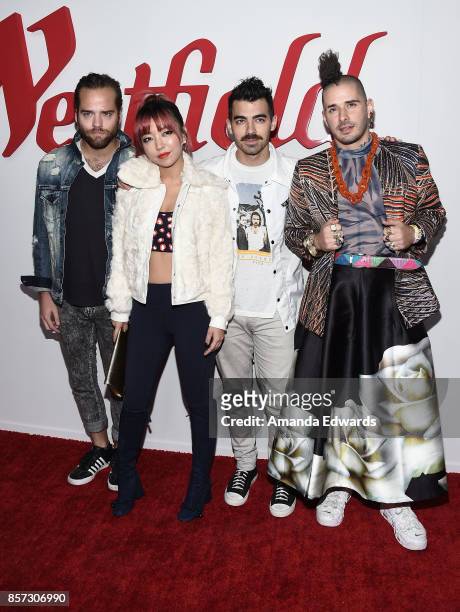 Musicians Jack Lawless, JinJoo Lee, Joe Jonas and Cole Whittle of the band DNCE arrive at the grand opening of Westfield Century City at Westfield...
