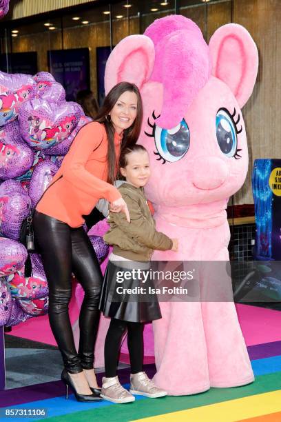 Singer Kate Hall with her daughter Kate Hall and her daughter Ayana Haley Hall-Soost attend the 'My little Pony' Premiere at Zoo Palast on October 3,...