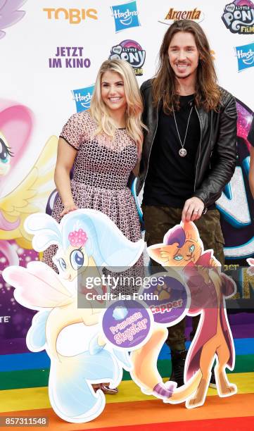 Swis singer Beatrice Egli and German singer Gil Ofarim attend the 'My little Pony' Premiere at Zoo Palast on October 3, 2017 in Berlin, Germany.