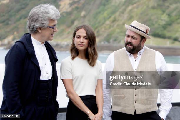 Wim Wenders Alicia Vikander and Celyn Jones attends 'Submergence' photocall during 65th San Sebastian Film Festival on September 22, 2017 in San...