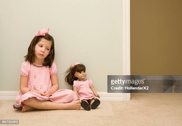 girl with matching doll - american girl doll stock pictures, royalty-free photos & images