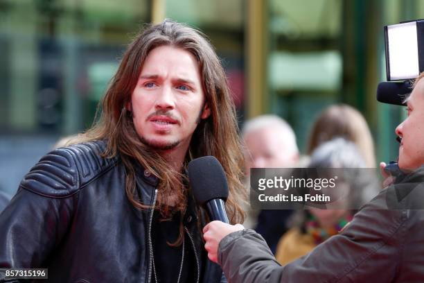 German singer Gil Ofarim attends the 'My little Pony' Premiere at Zoo Palast on October 3, 2017 in Berlin, Germany.