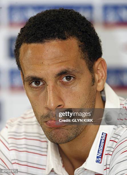 England defender Rio Ferdinand attends a press conference following a training session for the forthcoming World Cup Qualifying match against...