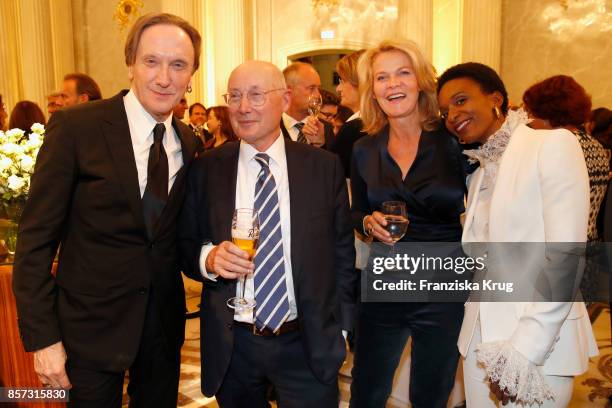 Marius Mueller-Westernhagen, Stefan Aust, Karin Hinrichs-Aust and Lindiwe Suttle attend the Re-Opening of the Staatsoper Unter den Linden on October...