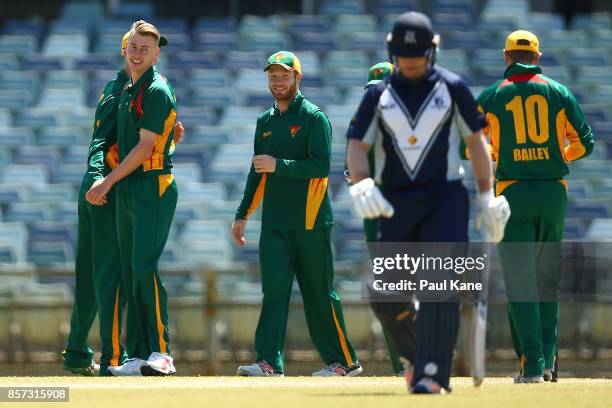 Riley Meredith of the Tigers celebrates the wicket of Travis Dean of the Bushrangers during the JLT One Day Cup match between Victoria and Tasmania...