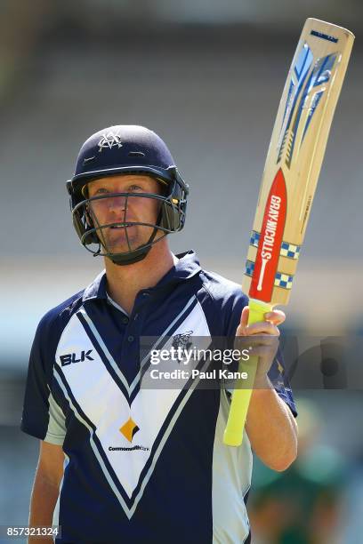 Cameron White of the Bushrangers acknowledges the members after being dismissed during the JLT One Day Cup match between Victoria and Tasmania at...