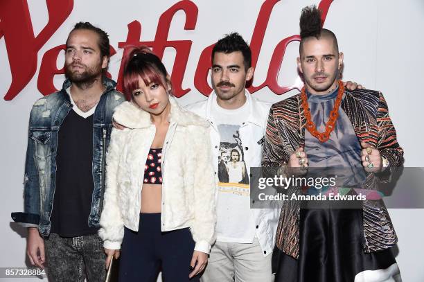 Musicians Jack Lawless, JinJoo Lee, Joe Jonas, and Cole Whittle of the band DNCE arrives at the grand opening of Westfield Century City at Westfield...