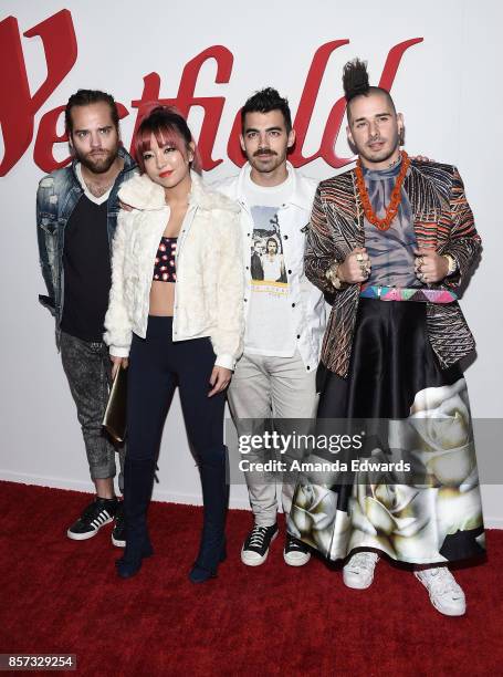 Musicians Jack Lawless, JinJoo Lee, Joe Jonas, and Cole Whittle of the band DNCE arrive at the grand opening of Westfield Century City at Westfield...