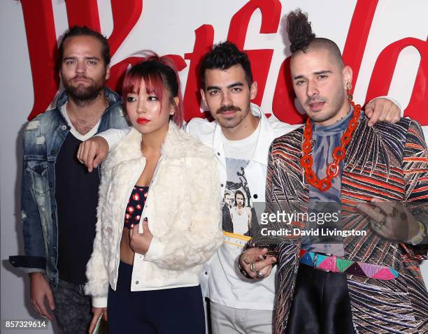 Musicians Jack Lawless, JinJoo Lee, Joe Jonas and Cole Whittle of DNCE attend the grand opening of Westfield Century City at Westfield Century City...
