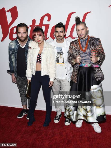 Musicians Jack Lawless, JinJoo Lee, Joe Jonas, and Cole Whittle of the band DNCE arrive at the grand opening of Westfield Century City at Westfield...