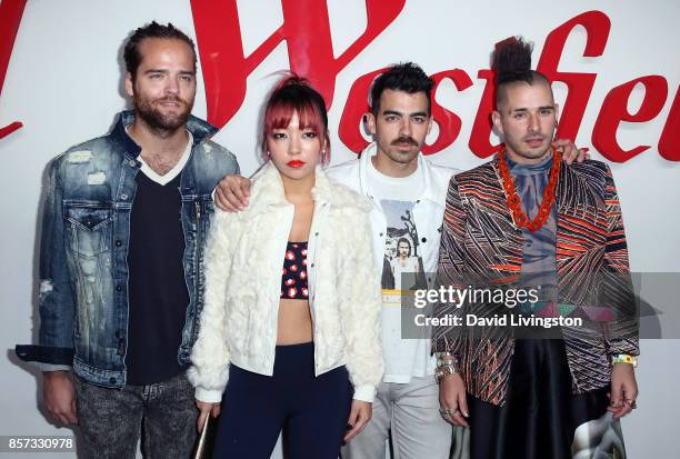 Musicians Jack Lawless, JinJoo Lee, Joe Jonas and Cole Whittle of DNCE attend the grand opening of Westfield Century City at Westfield Century City...