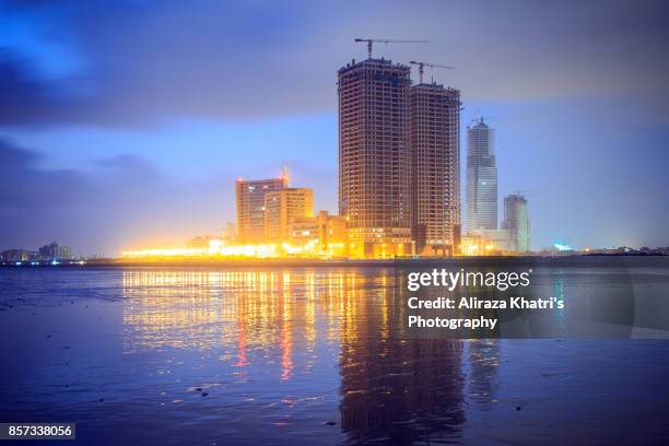 city uprising construction background abstracts - karachi stock pictures, royalty-free photos & images