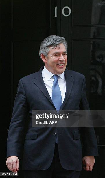 British Prime Minister Gordon Brown waits on the steps of 10 Downing Street, in London, on March 31 to meet with South Korean President Lee...