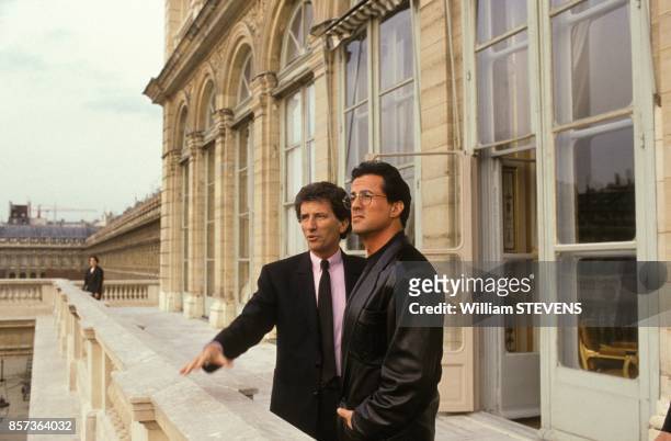 Sylvester Stallone au ministere de la Culture avec Jack Lang le 18 mars 1991 a Paris, France.