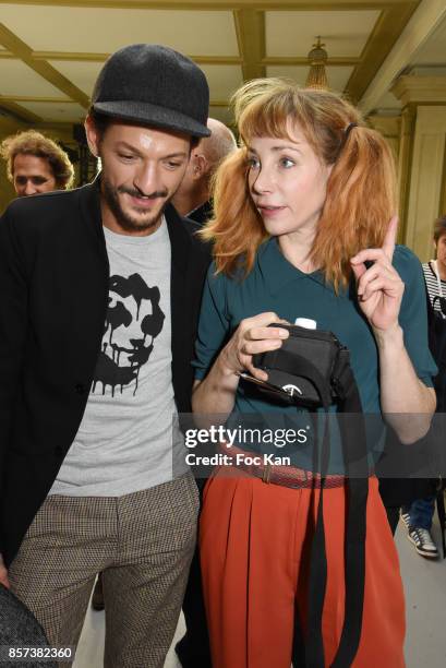 Vincent Dedienne and Julie Depardieu attend the Agnes B. Show as part of the Paris Fashion Week Womenswear Spring/Summer 2018 on October 3, 2017 in...