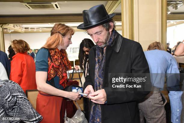 Singer Arthur H and Julie Depardieu attend the Agnes B. Show as part of the Paris Fashion Week Womenswear Spring/Summer 2018 on October 3, 2017 in...