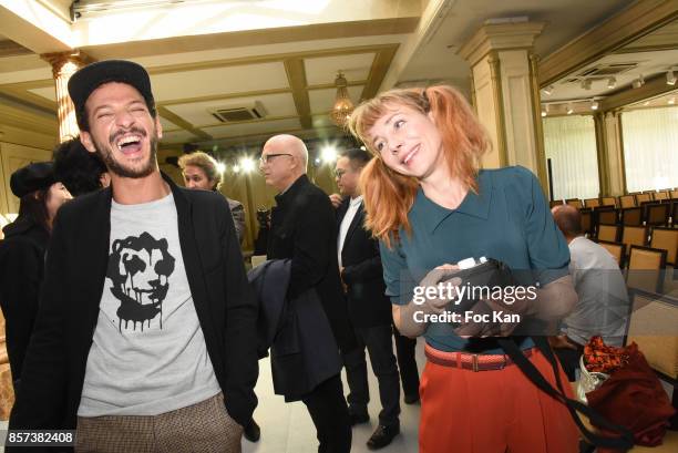 Vincent Dedienne and Julie Depardieu attend the Agnes B. Show as part of the Paris Fashion Week Womenswear Spring/Summer 2018 on October 3, 2017 in...