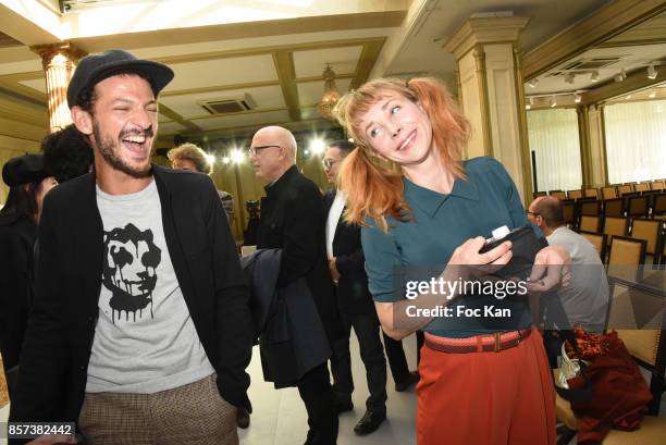 Vincent Dedienne and Julie Depardieu attend the Agnes B. Show as part of the Paris Fashion Week Womenswear Spring/Summer 2018 on October 3, 2017 in...