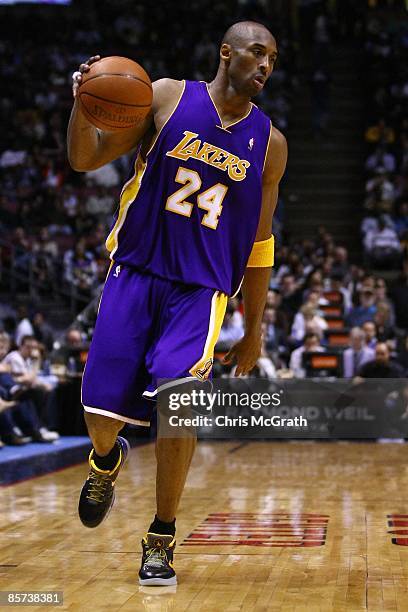 Kobe Bryant of the Los Angeles Lakers dribbles against the New Jersey Nets during the game on March 27, 2009 at the Izod Center in East Rutherford,...