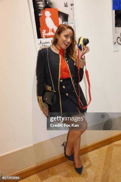 Blogger Mademoiselle Valerie style attends the "Lignee" by jean Charles de Castelbajac Father an sons hosted by Fujifilm X Instax Launch Exhibition...