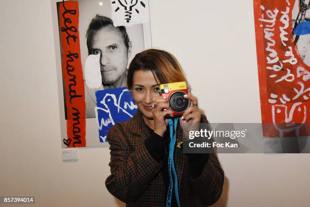 Presenter Karima Charni attend the "Lignee" by jean Charles de Castelbajac Father an sons hosted by Fujifilm X Instax Launch Exhibition Preview at...