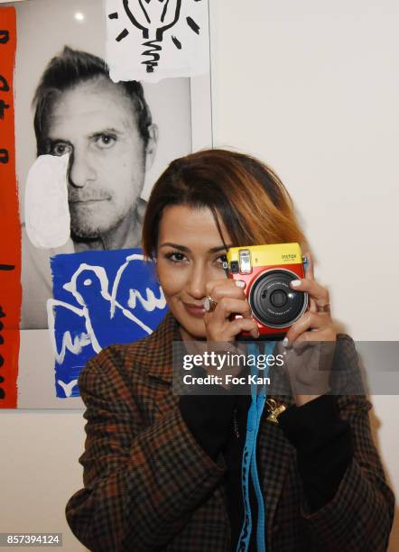 Presenter Karima Charni attend the "Lignee" by jean Charles de Castelbajac Father an sons hosted by Fujifilm X Instax Launch Exhibition Preview at...