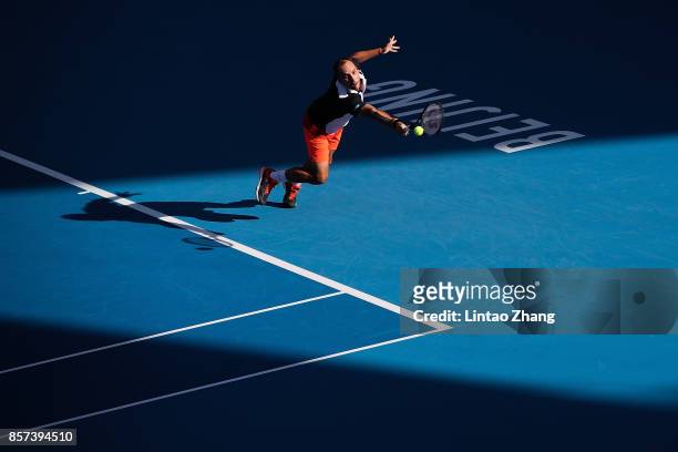 Steve Darcis of Belgium returns a shot against Dusan Lajovic of Serbia during the Men's singles second round on day five of 2017 China Open at the...