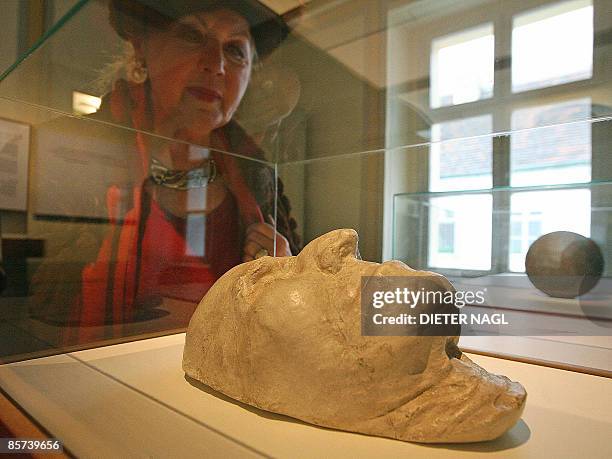 This file picture shows a visitor looking at a death mask Joseph Haydn during the opening of an exhibition "Haydn´s last Years" in his former house...