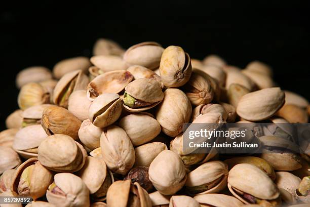 Pistachios sit on a table March 31, 2009 in San Francisco, California. The U.S. Food and Drug Administration is asking consumers to avoid eating...