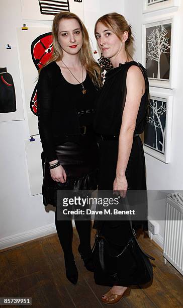 Daisy and Poppy de Villeneuve attend the private view of 'No Love Lost' an exhibition by Daisy de Villeneuve and Natasha Law, at the Eleven Gallery...