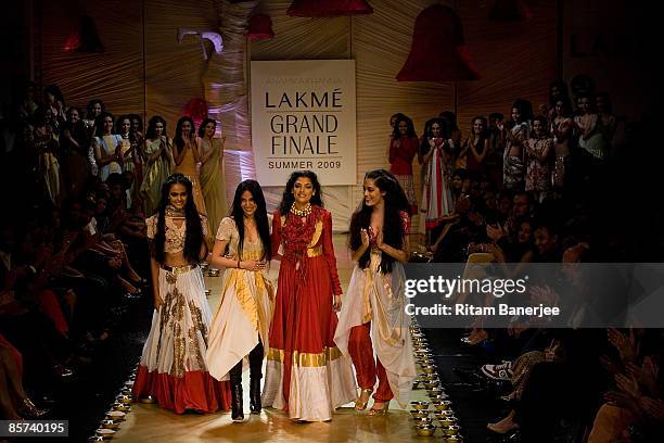 Designer Anamika Khanna walk the runway with the 'Faces of Lakme' Vipasha Agarwal, Indrani Dasgupta and Amrit Maghera at designer Anamika Khanna's...