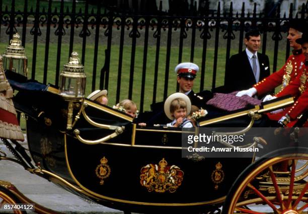 Prince William, who acted as a pageboy, rides in an open carriage with Prince Edward following the wedding of Prince Andrew, Duke of York and Sarah...
